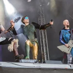 Gloryhammer ao vivo no Rockharz Open Air de 2018 em Ballenstedt, na Alemanha. Da esquerda para a direita: James Cartwright, Thomas Winkler e Paul Templing.